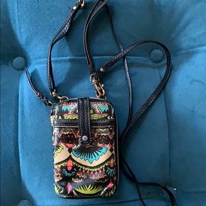 Wallet with removable straps.